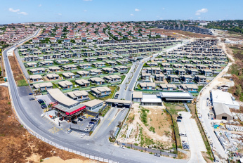 Closed village of villas with panorama of the lake and the sea